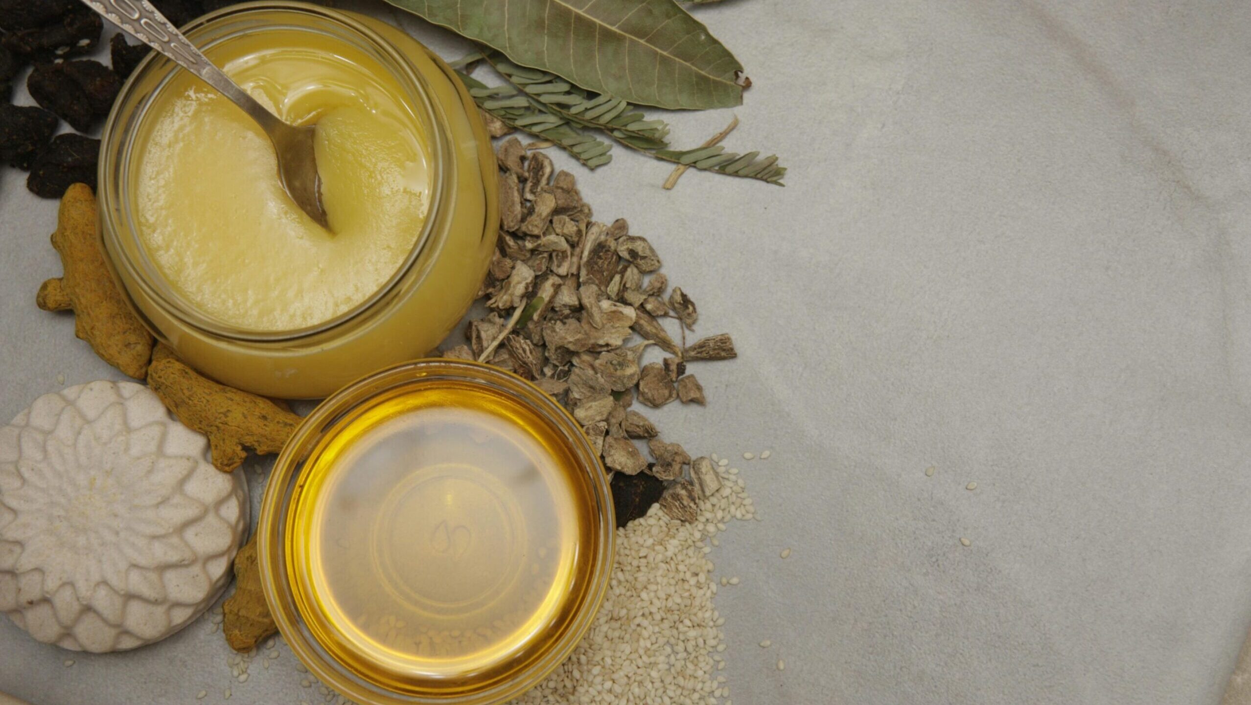 pexels-photo-20689436-20689436 A top-view of natural ingredients including honey, herbs, and leaves, perfect for healthy lifestyle themes.